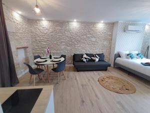 Appartements Le Studio Orchidee : photos des chambres