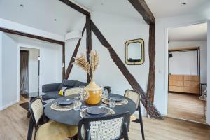 Appartements Sublim Apartment 2 Bedroom Le Marais Beaubourg (BTB24) : photos des chambres