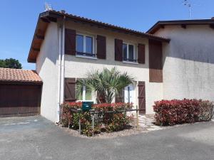 Maisons de vacances Charmante Maison au Bourg : photos des chambres