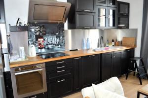 Appartements La Vigie - 30 m de la mer, petite vue mer : photos des chambres