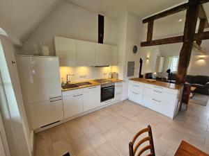 Haus-Ruhe-unter-Reet