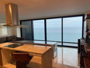 Super depa sobre el malecon alberca infinity