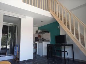 Maisons de vacances Petite maison avec jardin entre lac et village : photos des chambres