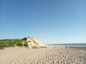 Maisons de vacances Petite maison avec jardin entre lac et village : photos des chambres