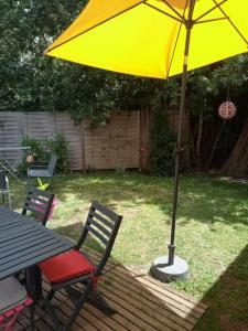 Maisons de vacances Petite maison avec jardin entre lac et village : photos des chambres