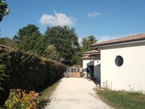 Maisons de vacances Petite maison avec jardin entre lac et village : photos des chambres