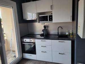 Appartements Bel appartement avec grand balcon et parking prive : photos des chambres