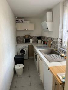 Appartements Maison avec jardin de 700m2 : photos des chambres
