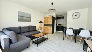 Appartements Appartement Sunrise au pied de la plage : photos des chambres