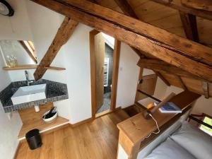 Appartements un nid sous les toits : photos des chambres