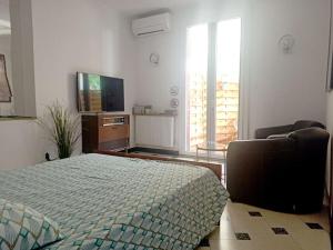 Appartements Proche Centre, Stationnement, Tram a 1 min, Clim : photos des chambres