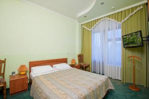 Family Room with Balcony room in Yug Hotel