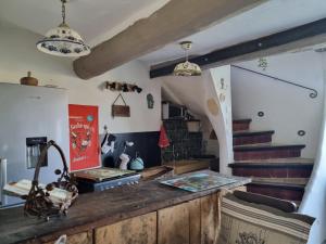 Maisons de vacances Maison ancienne romantique avec terrasse panoramique : photos des chambres