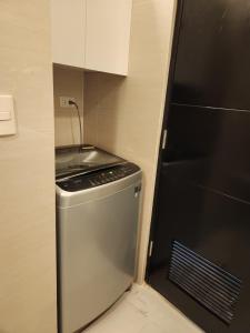 81 Newport C5 10i Balcony & Pool across NAIA T3