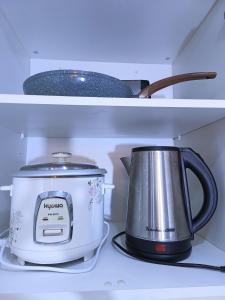 Two Palmtree Villas Across Manila Airport Terminal 3 -JJRMK Condotel