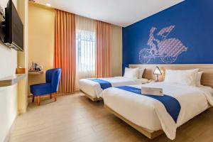 Phòng Hai Giường Đơn Loại Sang (Deluxe Twin Room)