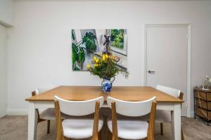 Elegant 2-Bedroom Getaway w Terrace & Garden Views