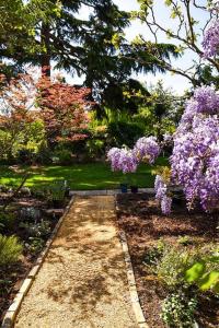 Elegant 2-Bedroom Getaway w Terrace & Garden Views