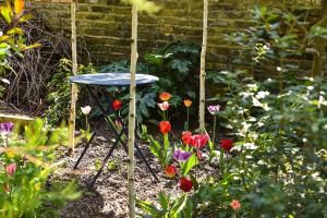 Elegant 2-Bedroom Getaway w Terrace & Garden Views