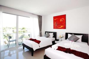 One World One Home Naiharn Hotel