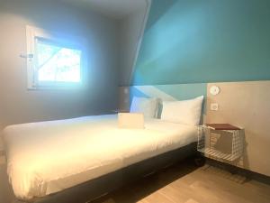Hotels Hotel Ibis Budget Montpellier Centre Millenaire - : photos des chambres