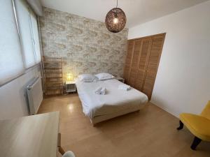 Appartements Saturne YourHostHelper : photos des chambres