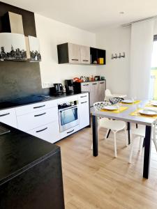 Villas Le Gite City Haut de gamme, Jardin, Piscine : photos des chambres