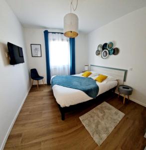 Villas Le Gite City Haut de gamme, Jardin, Piscine : photos des chambres