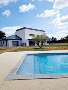 Villas Le Gite City Haut de gamme, Jardin, Piscine : photos des chambres