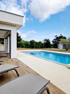 Villas Le Gite City Haut de gamme, Jardin, Piscine : photos des chambres