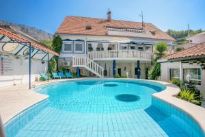 obrázek - Family friendly apartments with a swimming pool Sumpetar, Omis - 21633