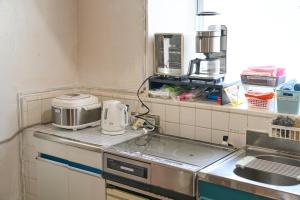 コザを楽しむ一軒家 Kaeruhouse