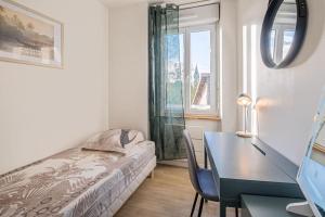 Appartements Le Magnifique T3 : photos des chambres