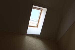 Budget Triple Room - Attic room in Passage Hotel