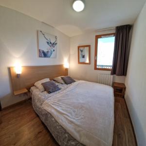 Appartements Les Orres 1800, les Chalets de Bois Mean, Vue Montagne a 200m des pistes : photos des chambres