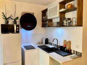 Appartements 2 chambres, grand jardin et parking : photos des chambres