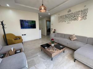 Chic 2BR Getaway with Large Balcony and Central AC