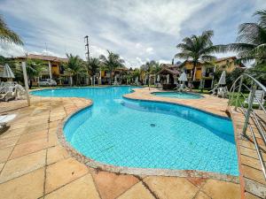 Casas no Residencial Moradas de Israel, com 3 suítes (todas com ar condicionado), internet 300MBPS e área gourmet privativa a aproximadamente 200m da praia de Taperapuã, (Axé Mói)com piscinas, sauna, portaria 24hrs