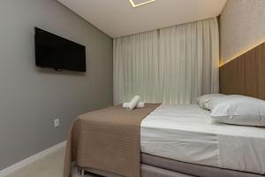 Caraíbas 202 – Lindíssimo Apartamento em Canto Grande, a 120 Metros do Mar - Piscina térreo.