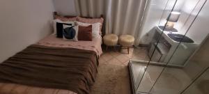 Banheiro de Vidro em Suíte compacta.Centro