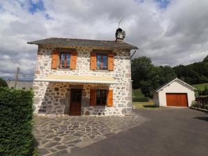 Maisons de vacances Gite Vic-sur-Cere, 3 pieces, 4 personnes - FR-1-742-354 : photos des chambres