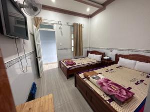 Phòng Hạng Tiết kiệm Cho 4 Người (Economy Quadruple Room)