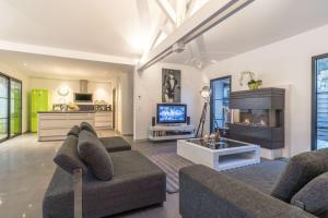 Appartements VILLA AMBIANCE (Pool) : photos des chambres