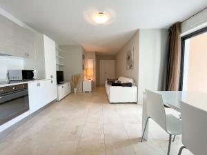 Appartements Deux pieces, parking et piscine : photos des chambres