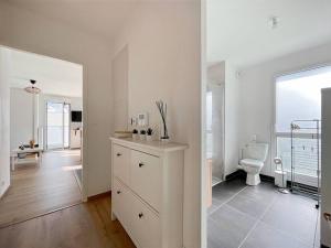 Appartements Perle de Baud - Centre - luxueux - Fitness : photos des chambres