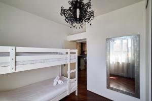 Appartements Le Dieu-Lumiere - Basilique Saint-Remi : photos des chambres