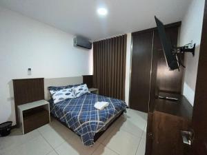 Departamentoo nuevo amoblado cerca a UAGRM, con excelente vista