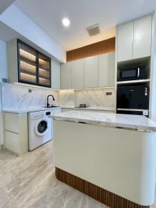 Insta-worthy staycation at 2BR luxury Apt - Podomoro Empire Tower