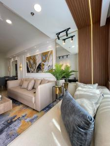 Insta-worthy staycation at 2BR luxury Apt - Podomoro Empire Tower