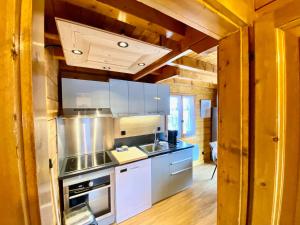 Chalets Chalet pistes 5 mn a pied vue montagne : photos des chambres